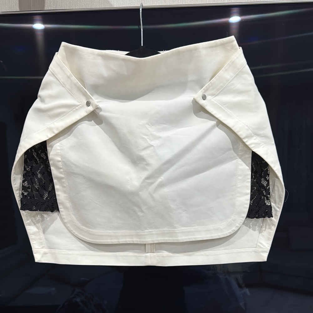 White Mini Skirt with Cut Out Details